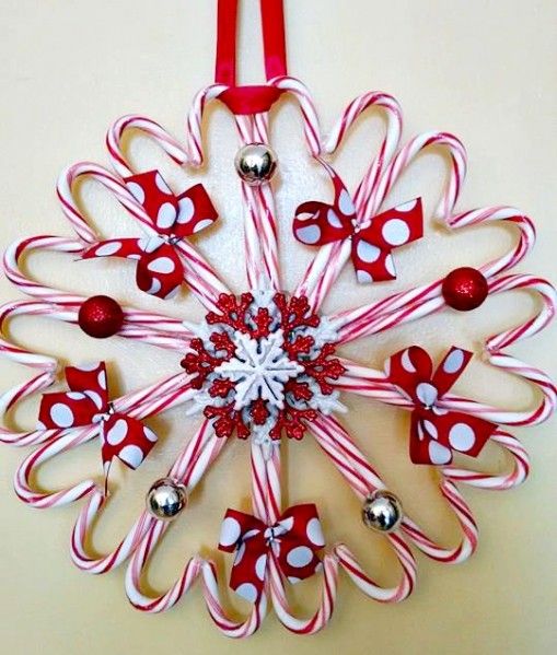 candy cane wreath with ornaments and bows