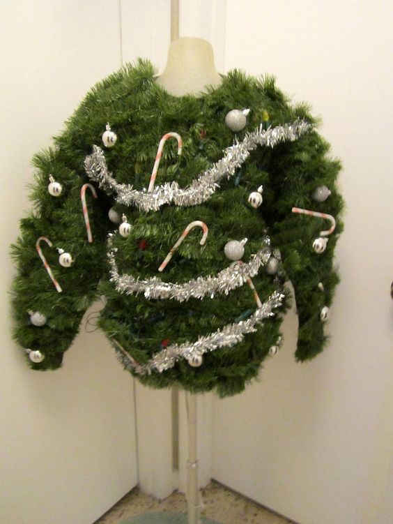 display an ugly evergreen sweater on a mannequin