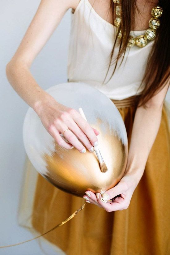 paint your balloons with metallic paint or glitter