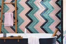 07 colorful green, black and pink tiles clad in a chevron pattern