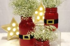 10 Santa suit mason jars with baby’s breath for centerpieces