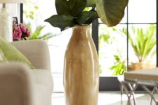 10 patina cream terra cotta floor vase with oversized leaves