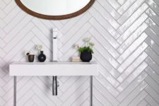 10 white gloss tiles with a chevron pattern are ideal for any bathroom