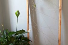 10 wooden frame with a twine web for display