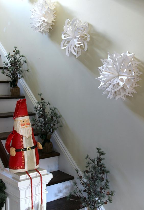 giant 3D ppaer snowflakes to line up the stairs