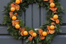 15 citrus and evergreen wreath for outdoors