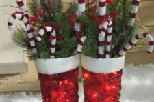 15 put Santa boots on your porh and fill them with evergreens and candy canes