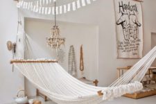 15 simple white fabric hammock in a light-filled space