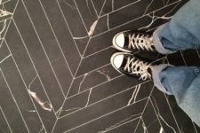16 chevron floor tiles with a stone imitating pattern