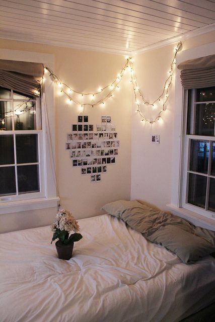 string lights over the bed to make your bed nook cozier