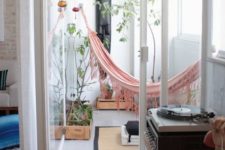 18 separate a nook from the rest of the room, put potted plants and hang a hammock