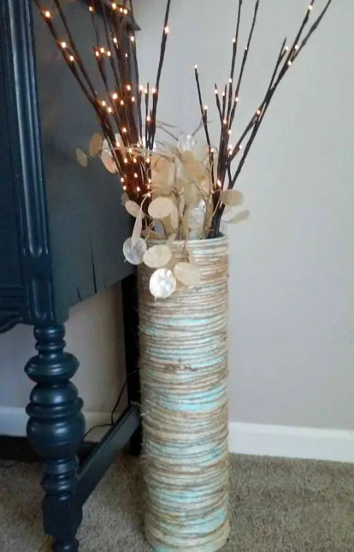wrapped floor vase with lighted branches