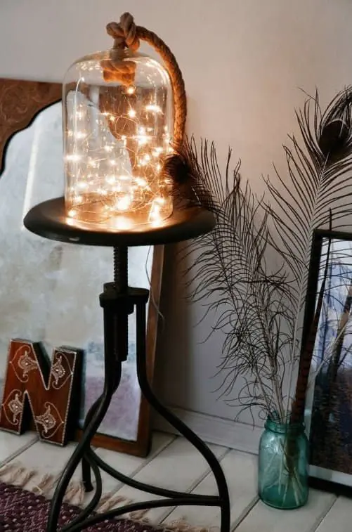 a cloche with lights inside