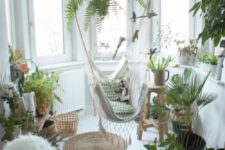22 balcony orangery with a crochcted white hammock chair
