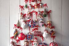 a bright and cool ornament Christmas wall-mounted tree of various funny decorations is super cool