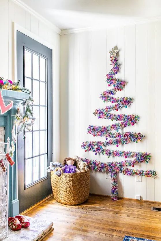 a colorful tinsel wall-mounted Christmas tree can be created on the wall in any space, for example, in an entryway