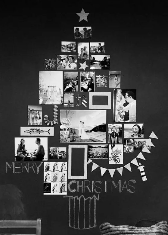 A wall mounted black and white Christmas tree made of photos is a cool and catchy decor idea
