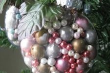 beautiful bead ornaments are pretty easy to make, they look bold and cool and add a glam vintage touch to the tree