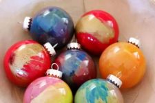 clear glass ornaments with super bold marble patterns are amazing to make your Christmas tree bright and fun
