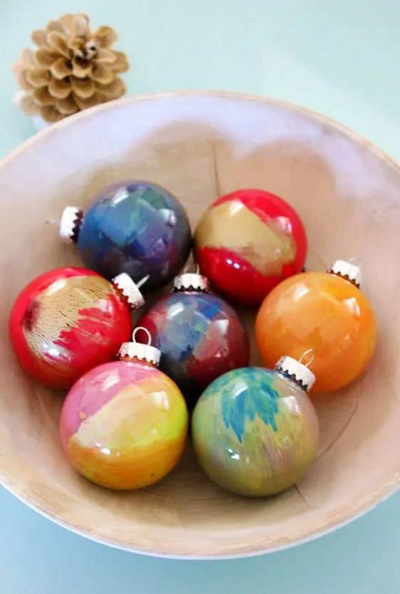 clear glass ornaments with super bold marble patterns are amazing to make your Christmas tree bright and fun