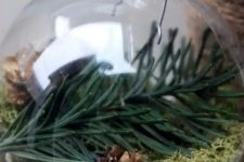evergreens, tiny pinecones and moss make a great nature-inspired ornament for a rustic or woodland Christmas tree