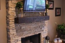 09 stone accent wall for a fireplace and a TV