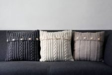 13 a trio of such pillows with buttons can be easily DIYed