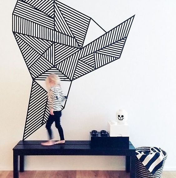 geometric wall art realized with washi tape right on the wall