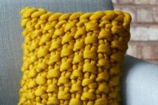 14 bold yellow chunky knitted panel cushion