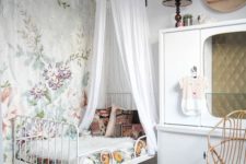 16 vintage-inspired room, floral bedding and a white tulle canopy