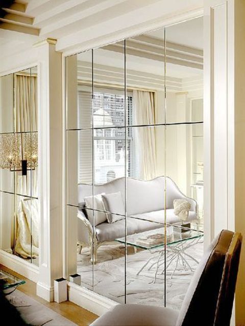 whole wall mirrors to maximize the light and space