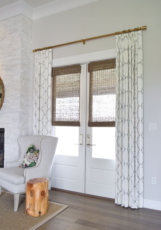 patterned curtains and bamboo shades for style and privacy