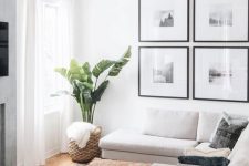 a neutral small living room with a sectional, a leather ottoman, a gallery wall, a woven lamp and a potted plant