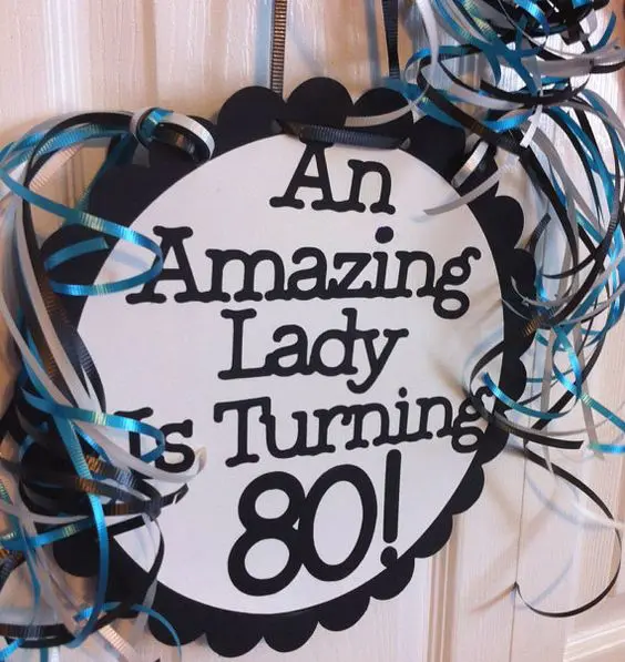 80th birthday party sign to rock