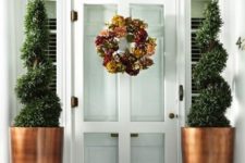 05 simple door with tall copper planters for a bold statement