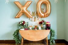 11 XO gold letter balloons for the drink station decor