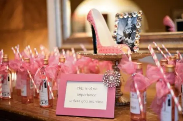 pink guest favors - small bottles of alcohol