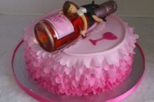 13 funny 40th birthday cake with a bottle on top