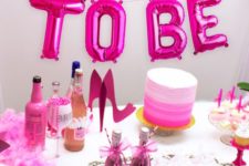 13 neon pink letter balloon garland as a backdrop