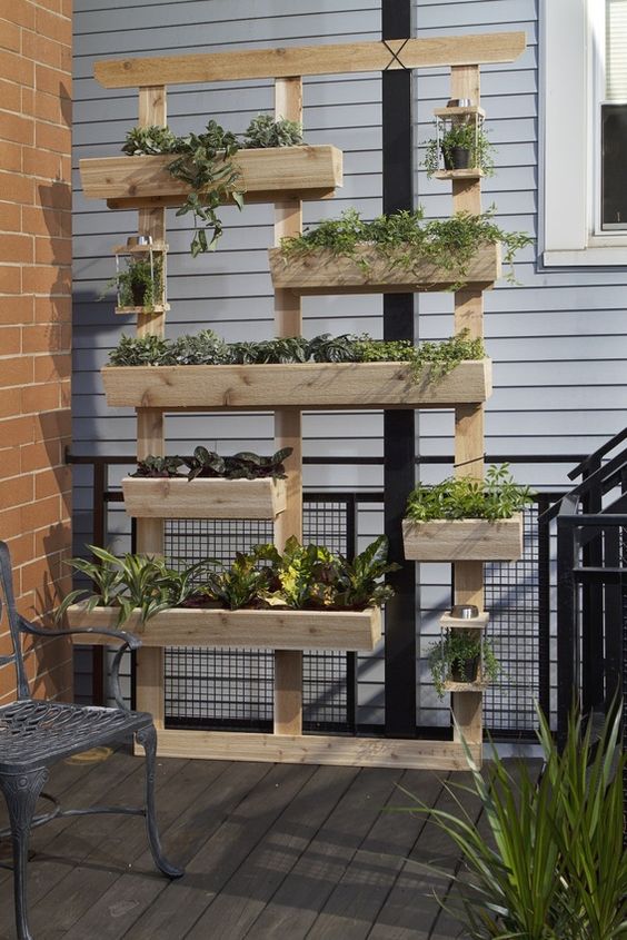 vertical garden system for a balcony made of wooden planks