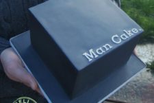 17 black square man cake with no other decor looks brutal