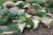 18 large rocks with greenery and flowers