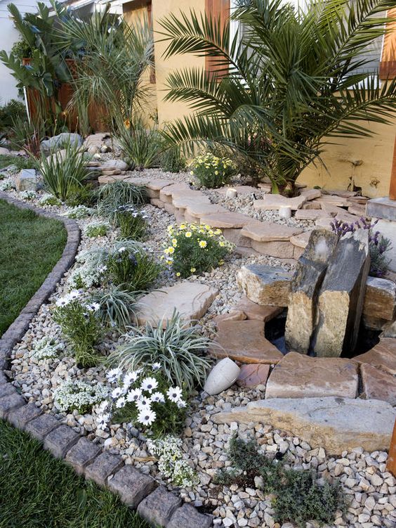 stones, white flowers and some grasses for a neutral look
