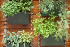 a hanging garden on chains of salvaged materials