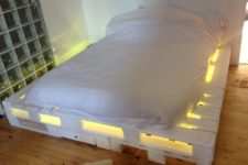 DIY pallet bed with lights and drawers