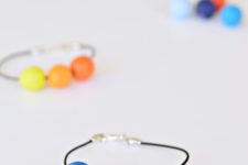 DIY friendship bracelets with clay beads and monograms