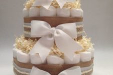 03 a simple rustic nappies cake with burlap ribbon and bows