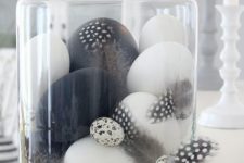 03 black and white feather egg display in jars