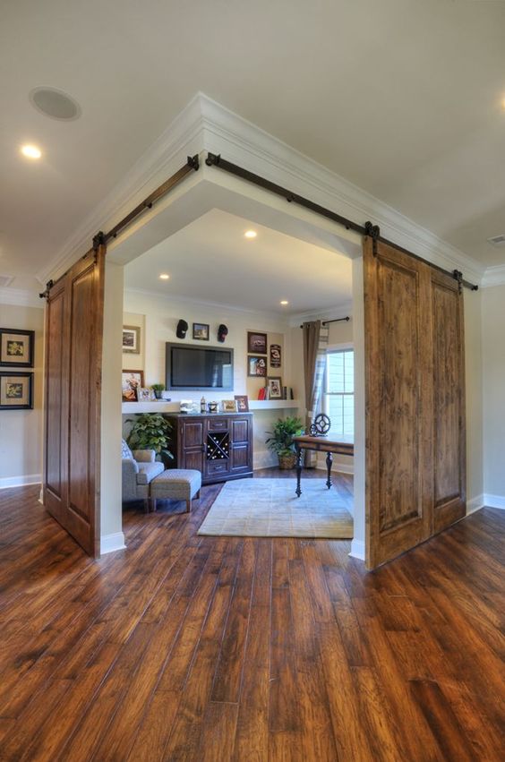 corner office or study area with double sliding barn doors