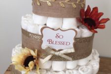 07 rustic-inspired diaper cake with burlap and gold leaf ribbon